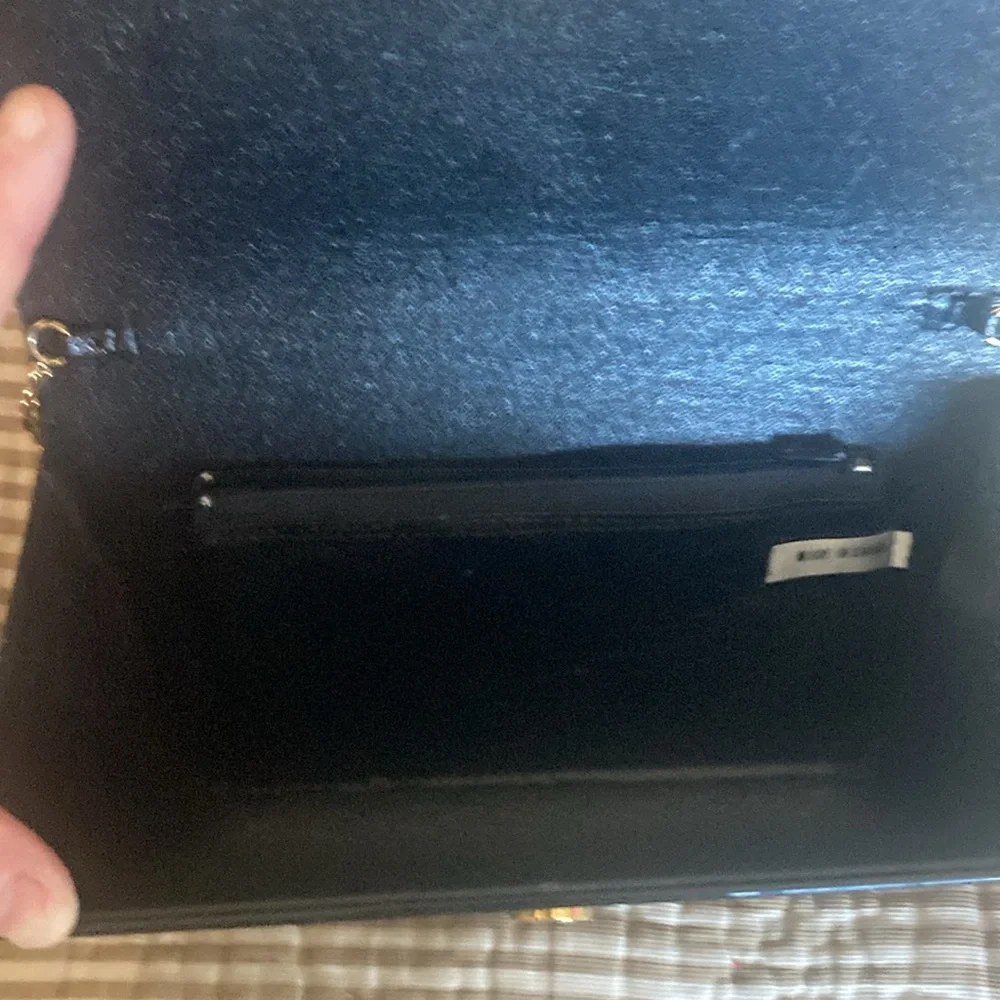Vintage black plastic clutch
